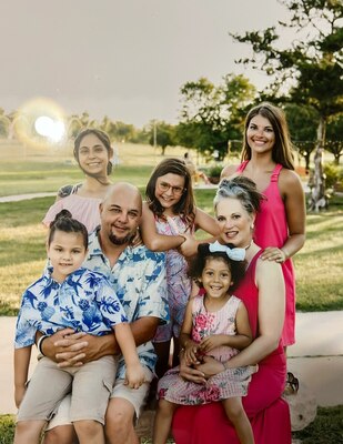 Mother and father with five children