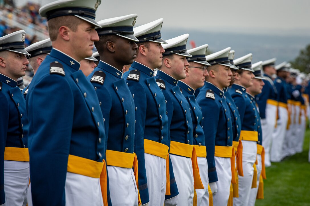 Cadets stand at attention during a ceremony.