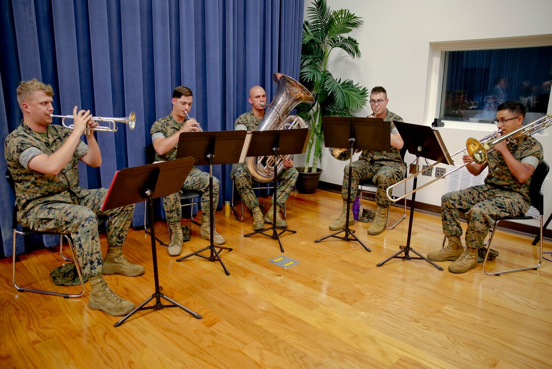 Officials at Marine Corps Logistics Base Albany celebrated a milestone more than a decade in the making on May 24 when they publicly announced that the installation recently became the first in the Department of Defense to accomplish Net Zero for energy. Among those at the ceremony to mark the achievement was Marine Corps Commandant Gen. David Berger, Assistant Secretary of the Navy for Energy, Installations and Environment Meredith Berger and MCLB Albany Commanding Officer Col. Michael Fitzgerald. The event also included employee recognition, a press conference, a tour of the base's energy facilities and an announcement of the Department of the Navy's Climate Action 2030. (U.S. Marine Corps photo by Jennifer Parks)