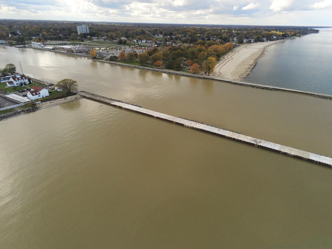 Piers at the mouth of a river on the Great Lakes.