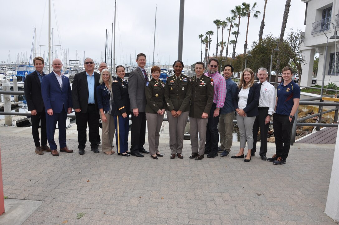 The US Army Corps of Engineers combined team poses for a photo before San Pedro Harbor, at the California Marine Affairs and Navigation Conference May 18-20 at San Pedro, California.