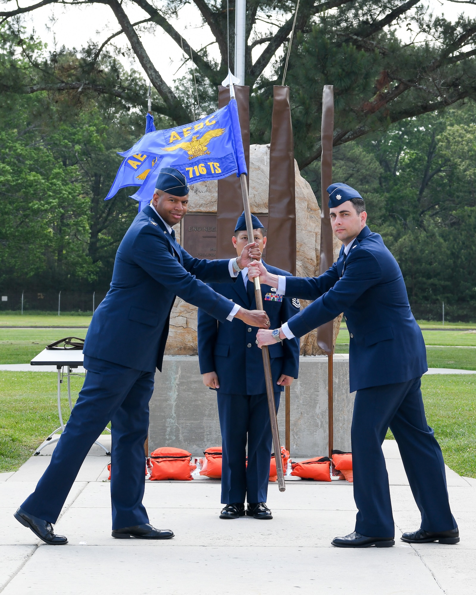 Col. Lincoln Bonner passes unit guidon to Lt. Col. John McShane