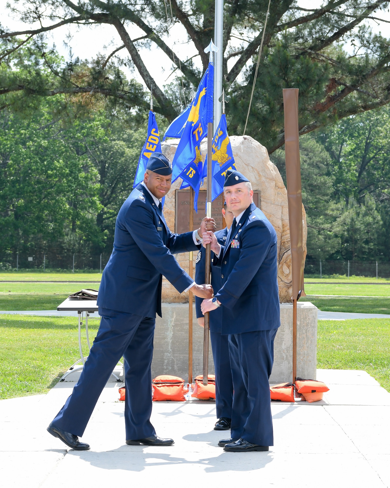Col. Lincoln Bonner passes unit guidon to Lt. Col. Dayvid Prahl
