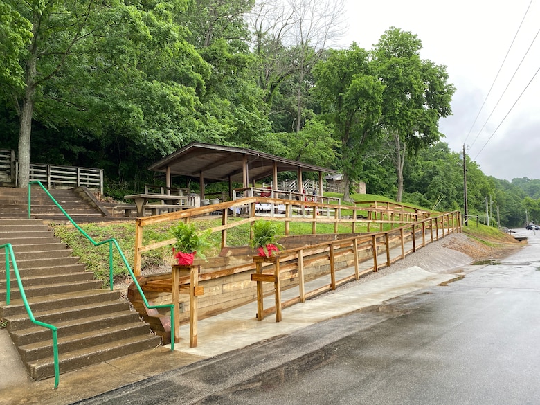 The access ramp is decorated with ferns and ribbons in preparation for the ribbon cutting ceremony May 23, 2022, at Waitboro Recreation Area in Somerset, Kentucky.  The ramp provides safe passage up the steep hill to the day-use shelter.
