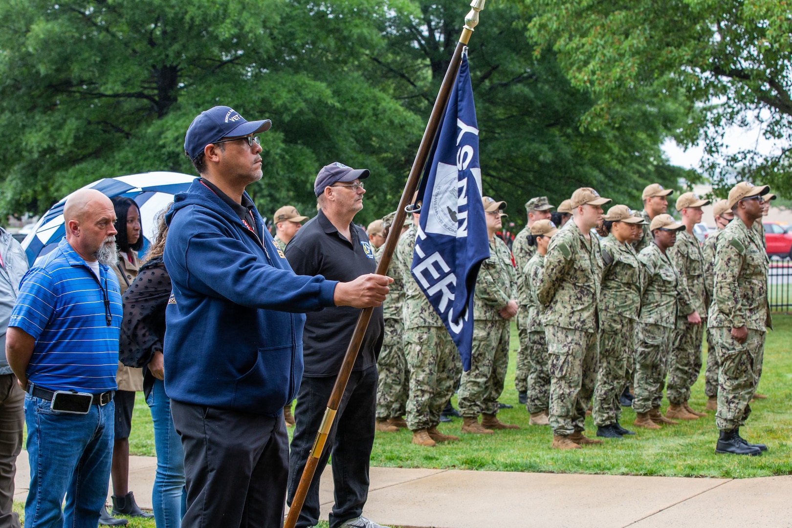 Norfolk Naval Shipyard Veterans Employee Readiness Group Founding Member Jonathan Echols joins fellow shipyarders and Sailors during the annual Memorial Day Fall-In for Colors May 25.
