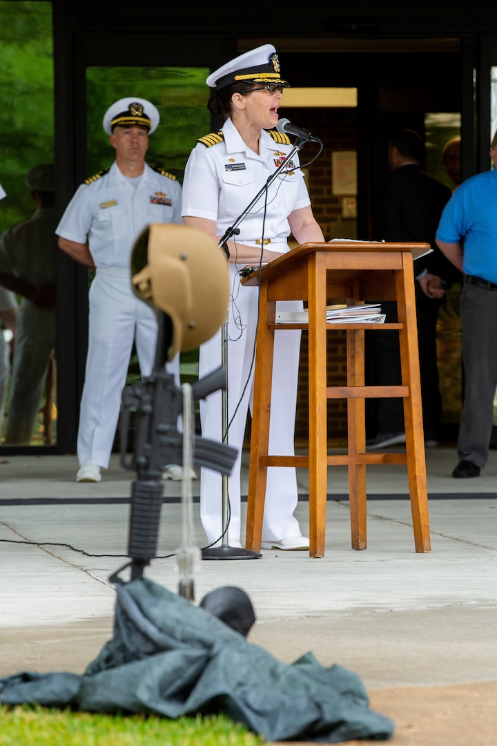 Norfolk Naval Shipyard Commander, Capt. Dianna Wolfson, provided opening remarks during the annual Memorial Day Fall-In for Colors May 25. “It’s important to remember those devoted heroes who lost their lives in defense of our Nation and honor those who had the discipline to willingly sacrifice their lives to protect their families, their community, and our country,” said Capt. Wolfson. “They had the responsibility to shoulder this burden with purpose and pride. They had the integrity to do what is right and honor their commitments to their dying breath.”