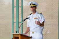 The guest speaker for Norfolk Naval Shipyard's annual Memorial Day Fall-In for Colors May 25 was Commander Frank Gasperetti, Code 900 Production Resource Officer for the shipyard. He shared a story of his fallen friend, Lt. Col. Geoff Hollopeter of the U.S. Marine Corps. “Geoff’s death left an unfillable hole in the hearts of his family, his community and all those he touched. His friendships, his bravery and his commitment to duty will never be lost," he said. "I must continue to share stories of Geoff as we as a Nation must continue to share the stories of our fallen to remember what they sacrificed for the rest of us. Not many people decide for themselves to put their lives on the line to protect our freedom, defend our Constitution, and to volunteer to serve, knowing that death may be the outcome and for over a million military members, they made that ultimate sacrifice since the Revolutionary War. What we can do today, every day, is to ensure that those who make this choice and make the ultimate sacrifice can rest knowing they served with the thanks of grateful citizens and knowing that they will not be forgotten.”