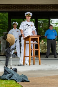 The guest speaker for Norfolk Naval Shipyard's annual Memorial Day Fall-In for Colors May 25 was Commander Frank Gasperetti, Code 900 Production Resource Officer for the shipyard. He shared a story of his fallen friend, Lt. Col. Geoff Hollopeter of the U.S. Marine Corps. “Geoff’s death left an unfillable hole in the hearts of his family, his community and all those he touched. His friendships, his bravery and his commitment to duty will never be lost," he said. "I must continue to share stories of Geoff as we as a Nation must continue to share the stories of our fallen to remember what they sacrificed for the rest of us. Not many people decide for themselves to put their lives on the line to protect our freedom, defend our Constitution, and to volunteer to serve, knowing that death may be the outcome and for over a million military members, they made that ultimate sacrifice since the Revolutionary War. What we can do today, every day, is to ensure that those who make this choice and make the ultimate sacrifice can rest knowing they served with the thanks of grateful citizens and knowing that they will not be forgotten.”