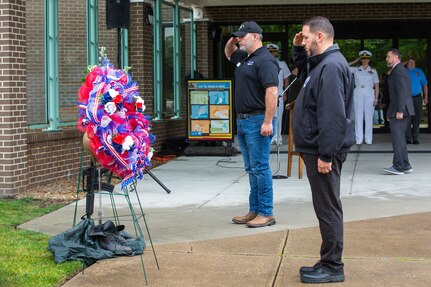 Norfolk Naval Shipyard Veteran Employee Readiness Group Information Officer Nicholas Boyle and Federal Managers Association Chapter 3 President Eric Chops Clarke held a wreath dedication ceremony during the annual Memorial Day Fall-In for Colors May 25.