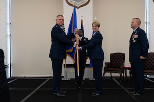 The passing of the guidon during a change of command ceremony.