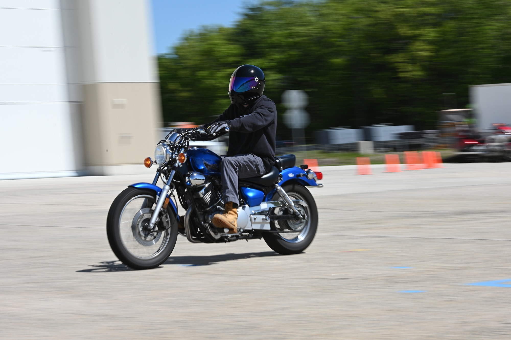 A motorcyclist rides on base.