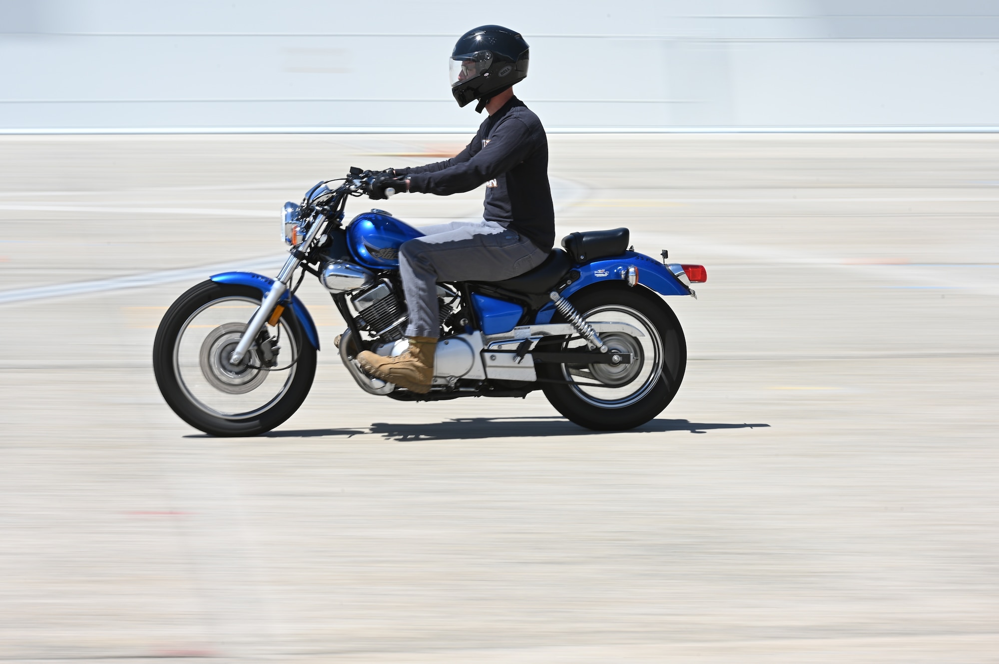 A motorcycle rides on base