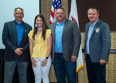 Erin Nilles, second from left, of Venedy, Illinois, a 2022 graduate of Okawville High School, Okawville, Illinois, was selected as a scholarship recipient in the amount of $2,500 at the annual National Guard Association of Illinois banquet and awards ceremony in Springfield, Illinois, May 20.