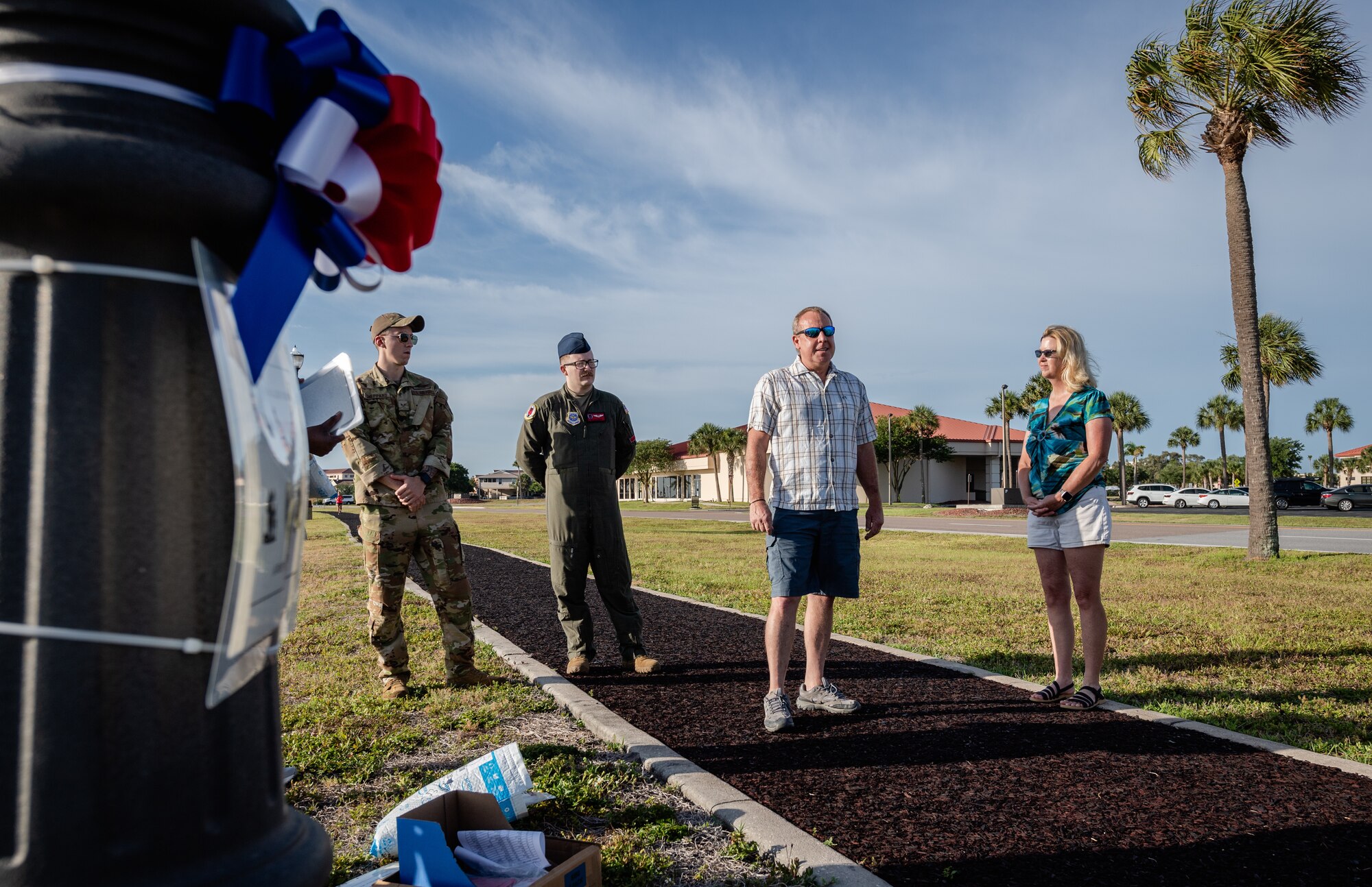 Gary Holman, surviving father of Tech. Sgt. Steven Holman, shares stories of his son with volunteers during the Second Annual Memorial Day Remebrance event at MacDill Air Force Base, Florida, May 25, 2022.