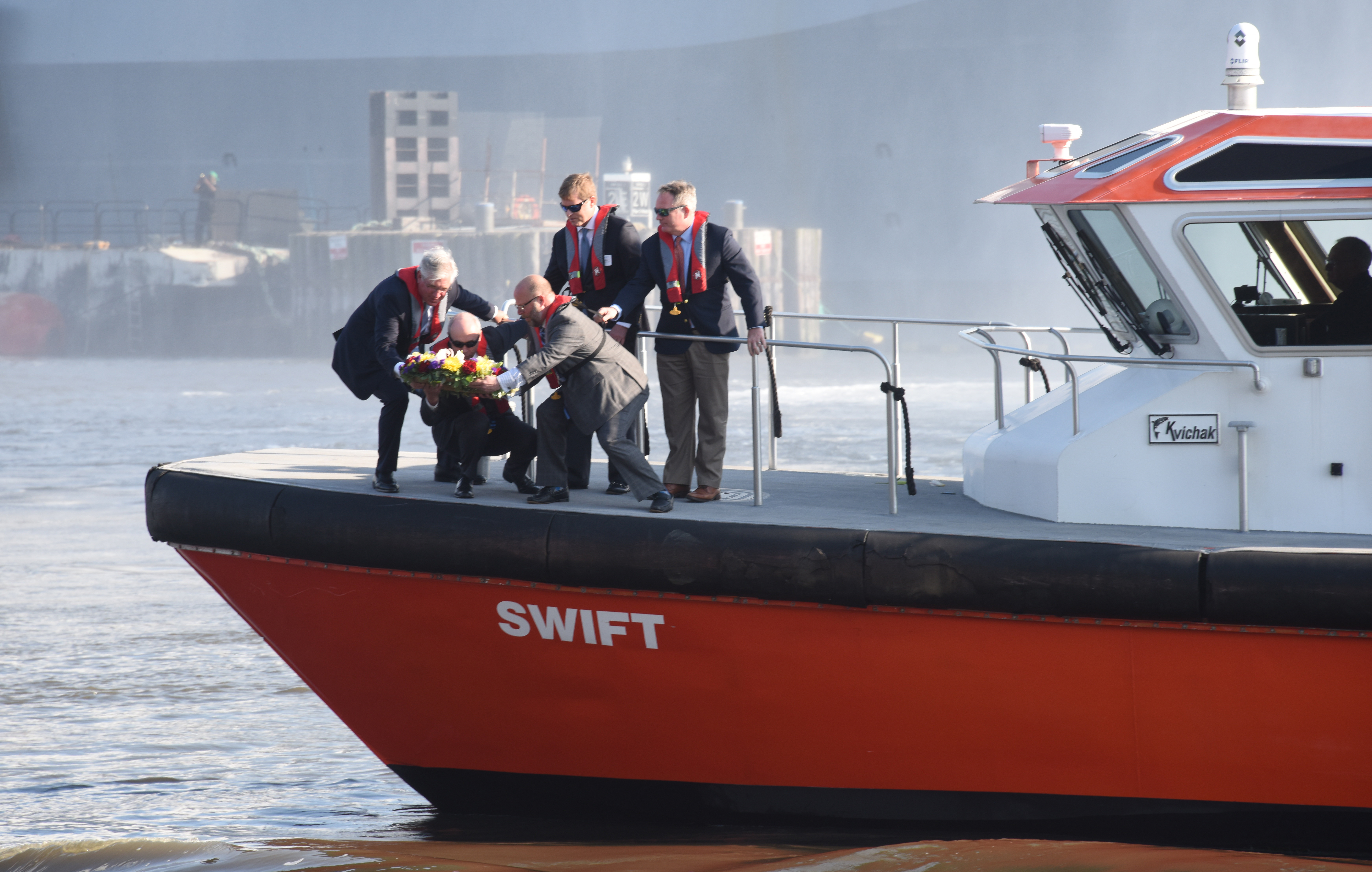 Officials conducted a ‘wreath laying’ ceremony and water salute in downtown Norfolk, Virginia, May 19, during a ceremony held for National Maritime Day.