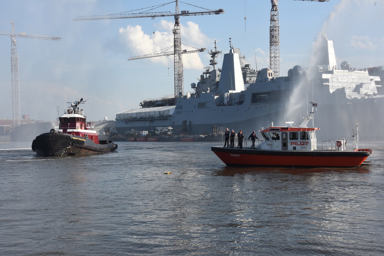 Officials conducted a ‘wreath laying’ ceremony and water salute in downtown Norfolk, Virginia, May 19, during a ceremony held for National Maritime Day.