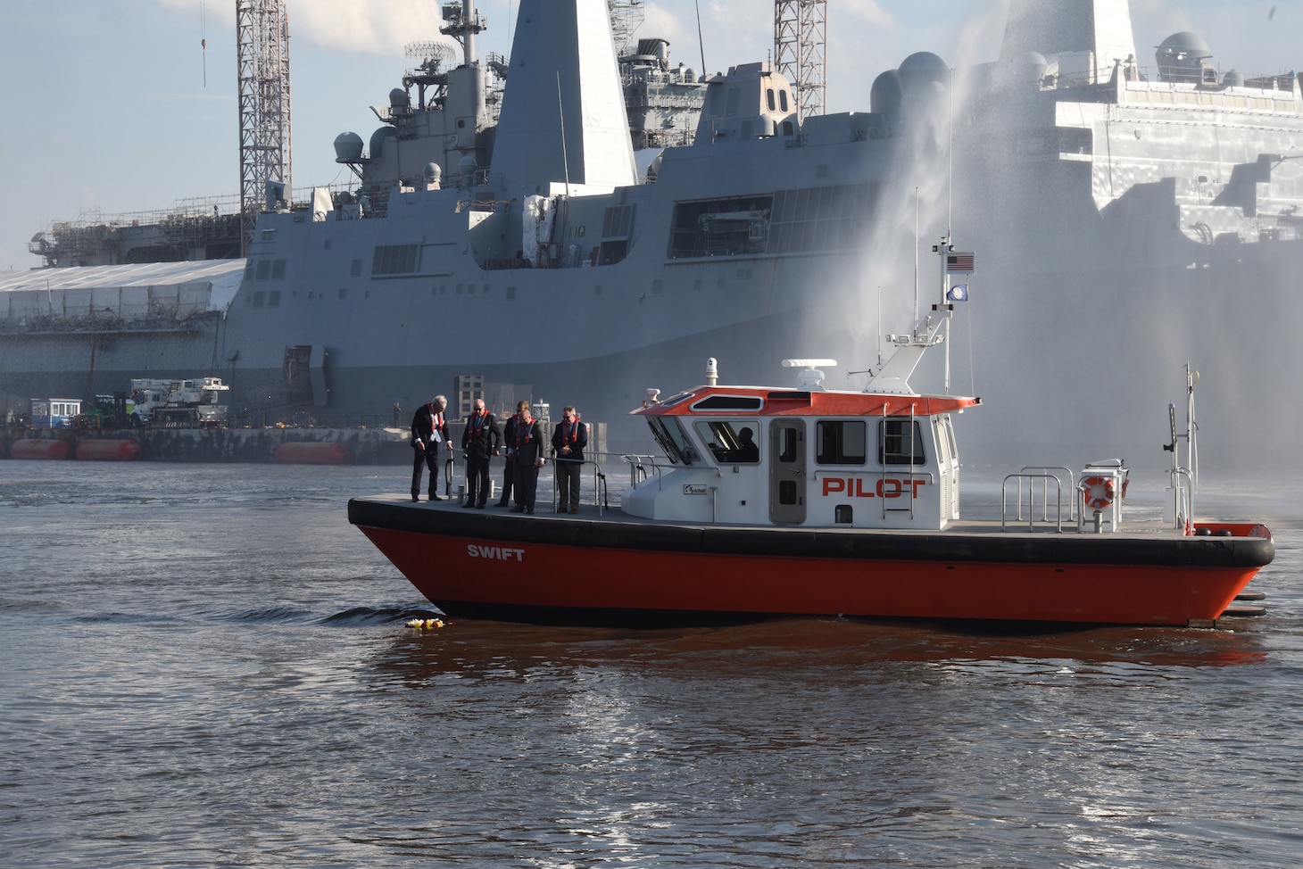 Officials conducted a ‘wreath laying’ ceremony and water salute in downtown Norfolk, Virginia, May 19, during a ceremony held for National Maritime Day.