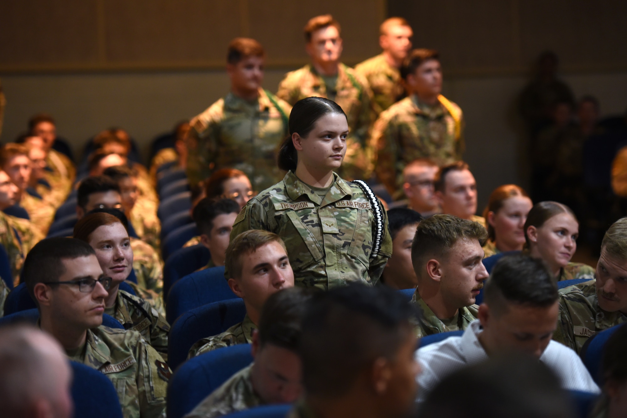 Airmen leaders assigned to the 315th Training Squadron are recognized for their dedication during the 315th TRS’s intelligence, surveillance, and reconnaissance professionals’ graduation ceremony, at Goodfellow Air Force Base, Texas, May 24, 2022.  Airmen Leaders are distinguished by an aiguillette, commonly known as a rope on their left shoulder, are held to a higher standard, and are responsible for a variety of leadership tasks. (U.S. Air Force photo by Senior Airman Abbey Rieves)