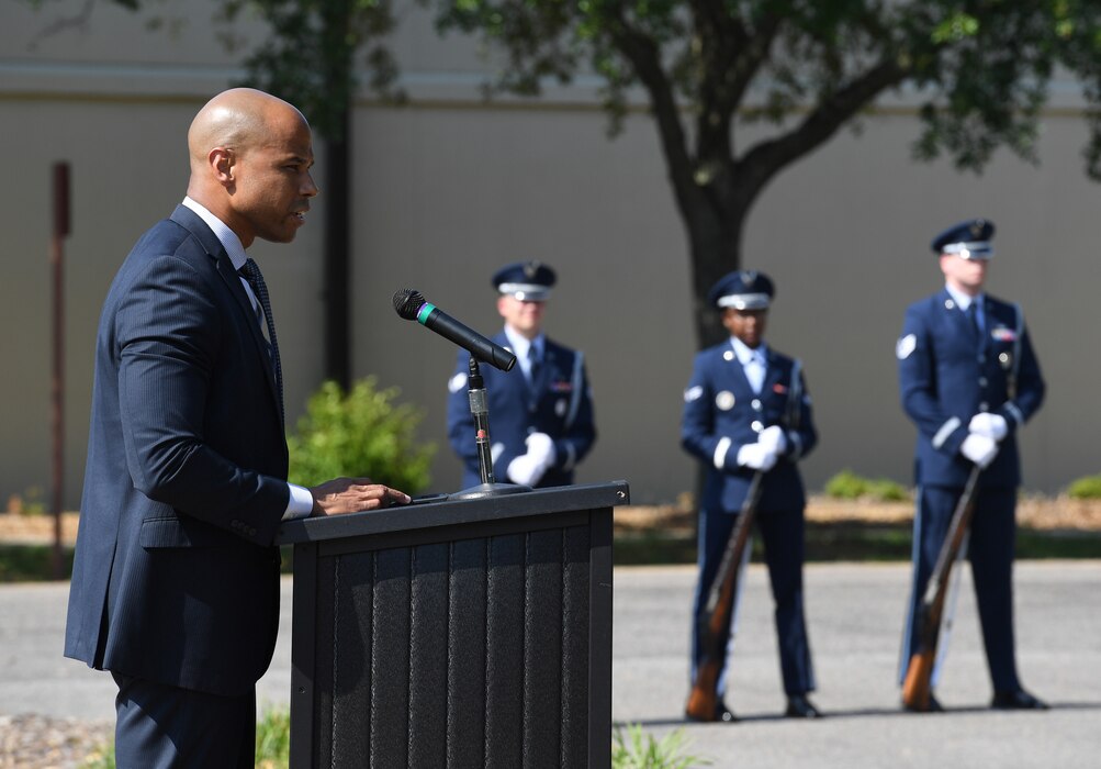 U.S. Air Force Special Agent Shannon Robinson, Office of Special Investigations Detachment 407 commander, delivers remarks during a retreat ceremony at Keesler Air Force Base, Mississippi, May 20, 2022. The ceremony, hosted by the 81st SFS, was the last of several events held in celebration of this year's Police Week. (U.S. Air Force photo by Kemberly Groue)