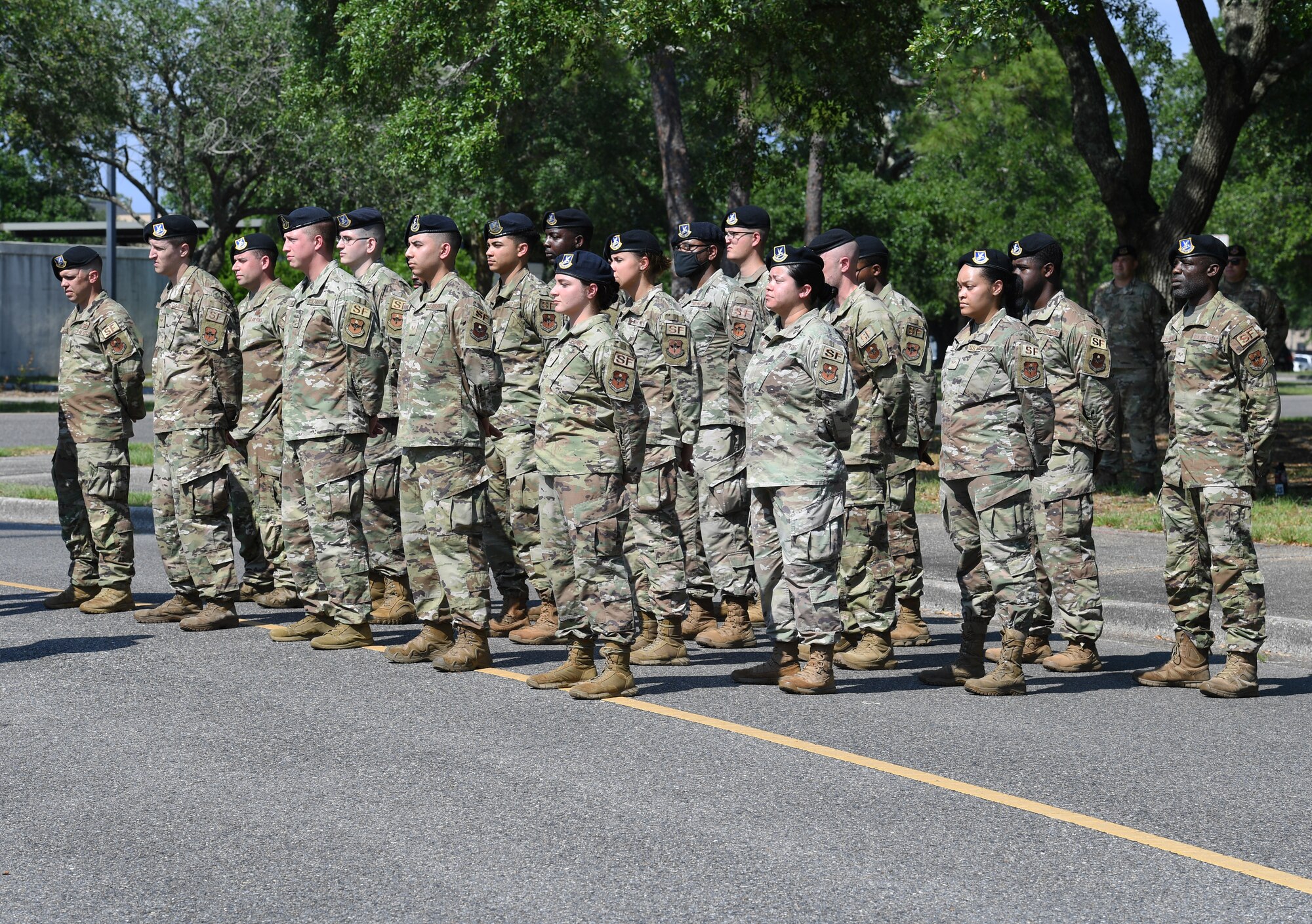 Members of the 81st Security Forces Squadron attend a retreat ceremony at Keesler Air Force Base, Mississippi, May 20, 2022. The ceremony, hosted by the 81st SFS, was the last of several events held in celebration of this year's Police Week. (U.S. Air Force photo by Kemberly Groue)
