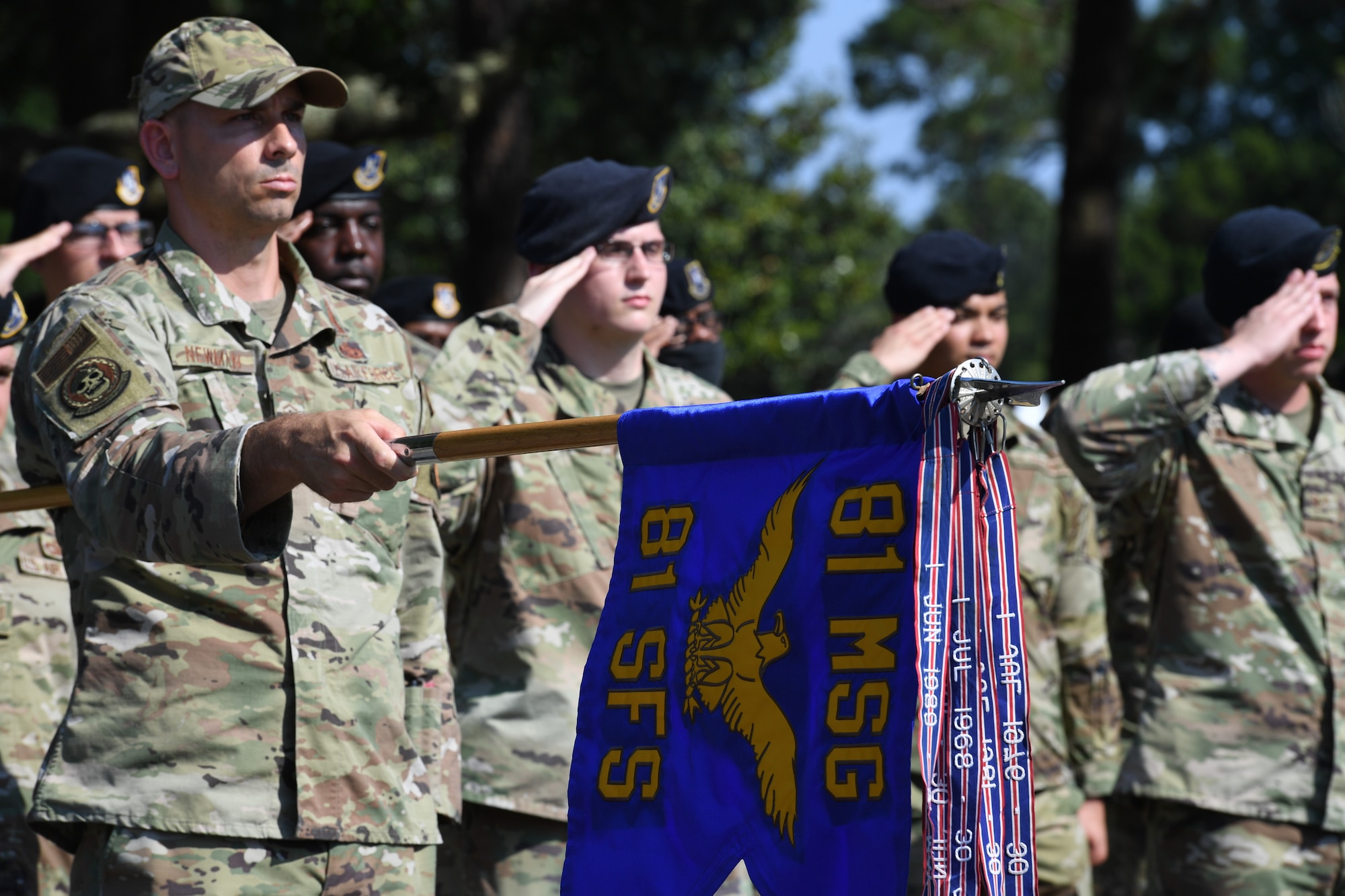 An 81st Security Forces Squadron guidon is displayed during a retreat ceremony at Keesler Air Force Base, Mississippi, May 20, 2022. The ceremony, hosted by the 81st SFS, was the last of several events held in celebration of this year's Police Week. (U.S. Air Force photo by Kemberly Groue)