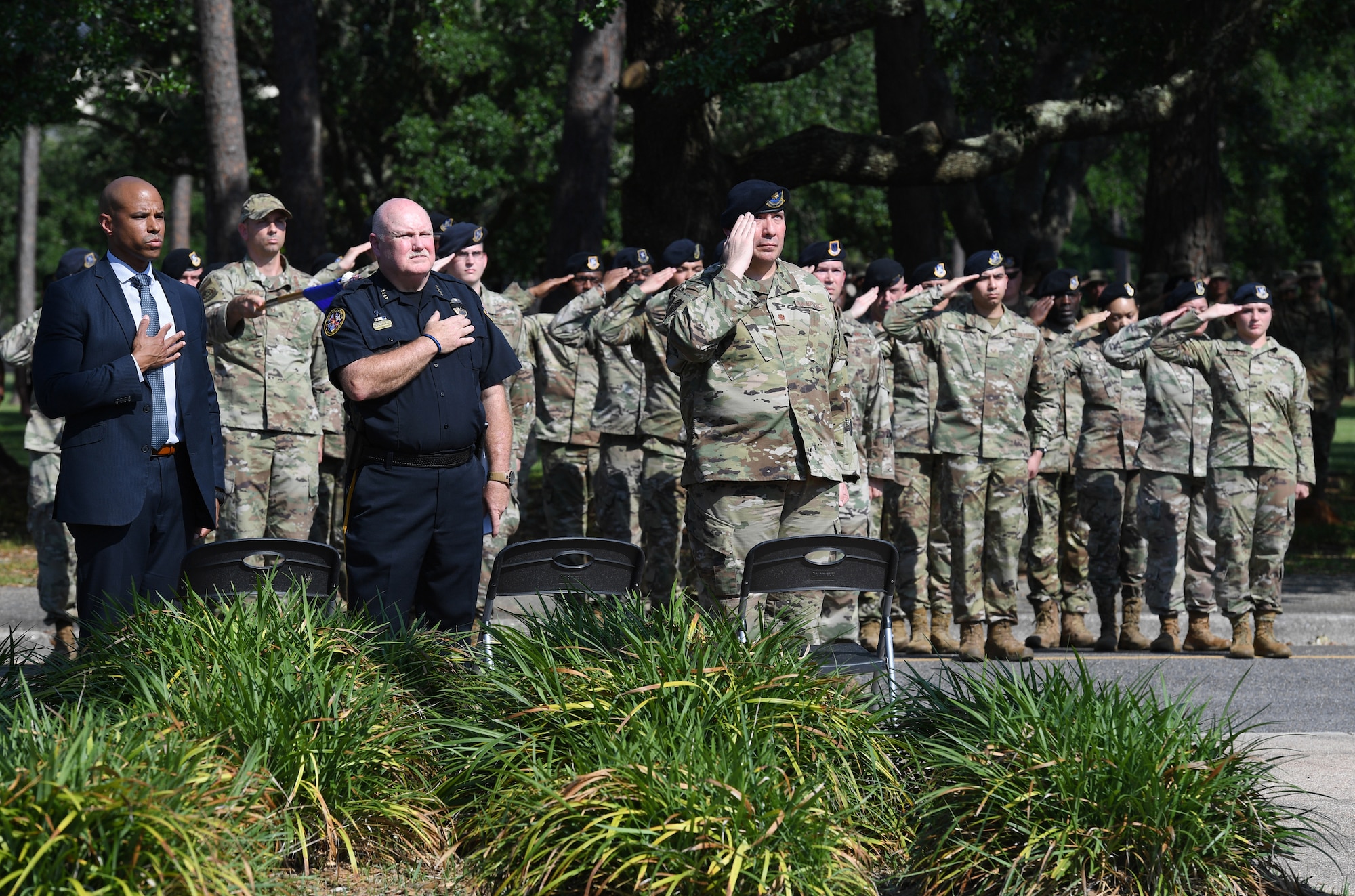 Members of the 81st Security Forces Squadron and local law enforcement agencies attend a retreat ceremony at Keesler Air Force Base, Mississippi, May 20, 2022. The ceremony, hosted by the 81st SFS, was the last of several events held in celebration of this year's Police Week. (U.S. Air Force photo by Kemberly Groue)