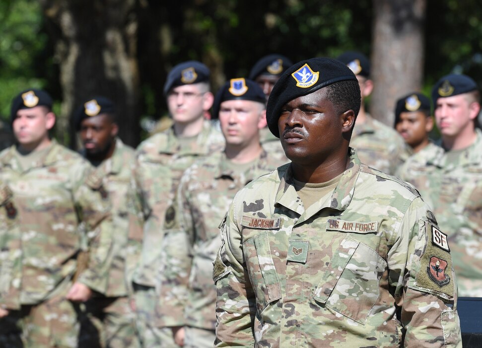 U.S. Air Force Staff Sgt. Andrew Jackson, 81st Security Forces Squadron physical security NCO in charge, stands at attention during a retreat ceremony at Keesler Air Force Base, Mississippi, May 20, 2022. The ceremony, hosted by the 81st SFS, was the last of several events held in celebration of this year's Police Week. (U.S. Air Force photo by Kemberly Groue)