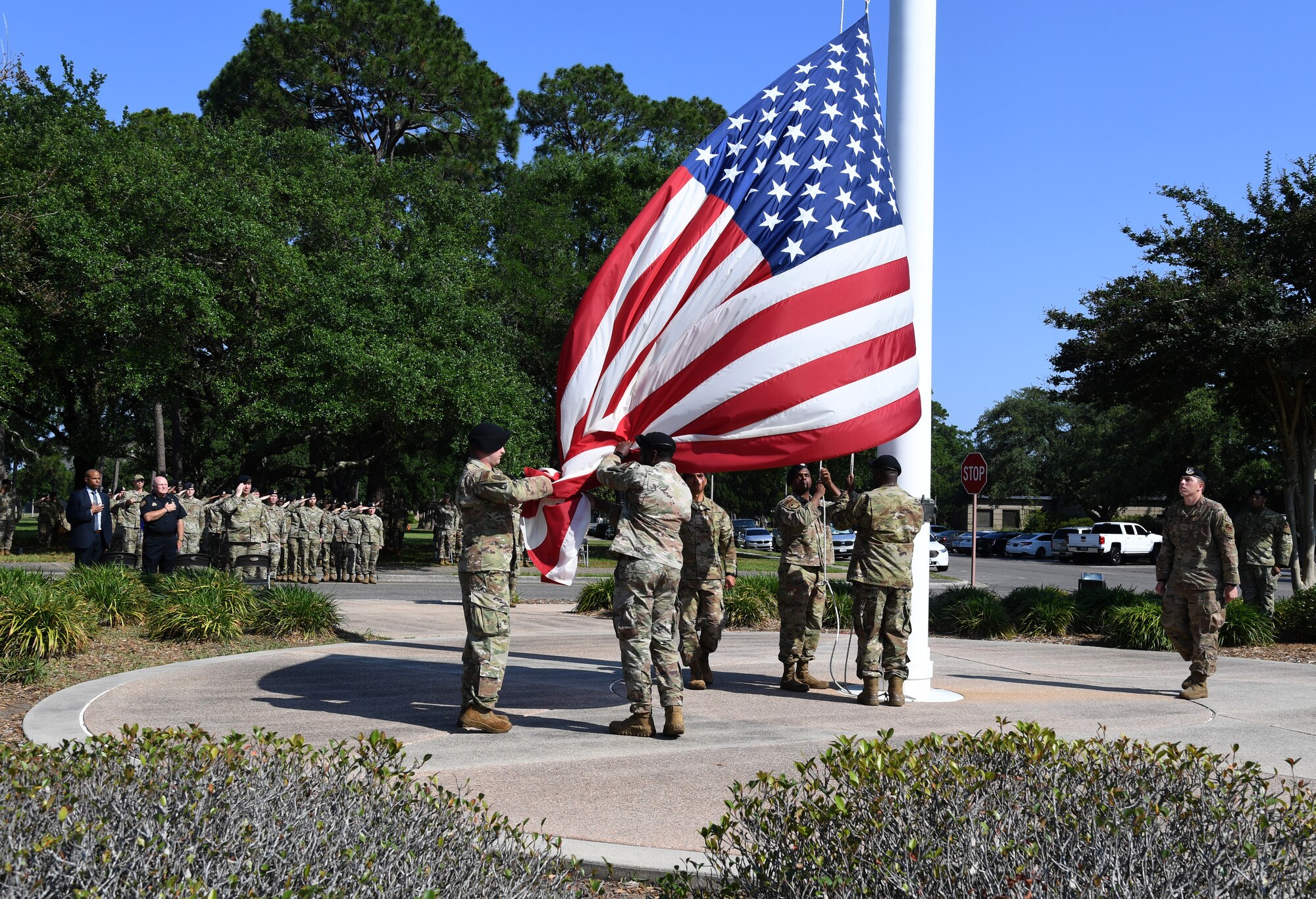 Members of the 81st Security Forces Squadron participate in a retreat ceremony at Keesler Air Force Base, Mississippi, May 20, 2022. The ceremony, hosted by the 81st SFS, was the last of several events held in celebration of this year's Police Week. (U.S. Air Force photo by Kemberly Groue)