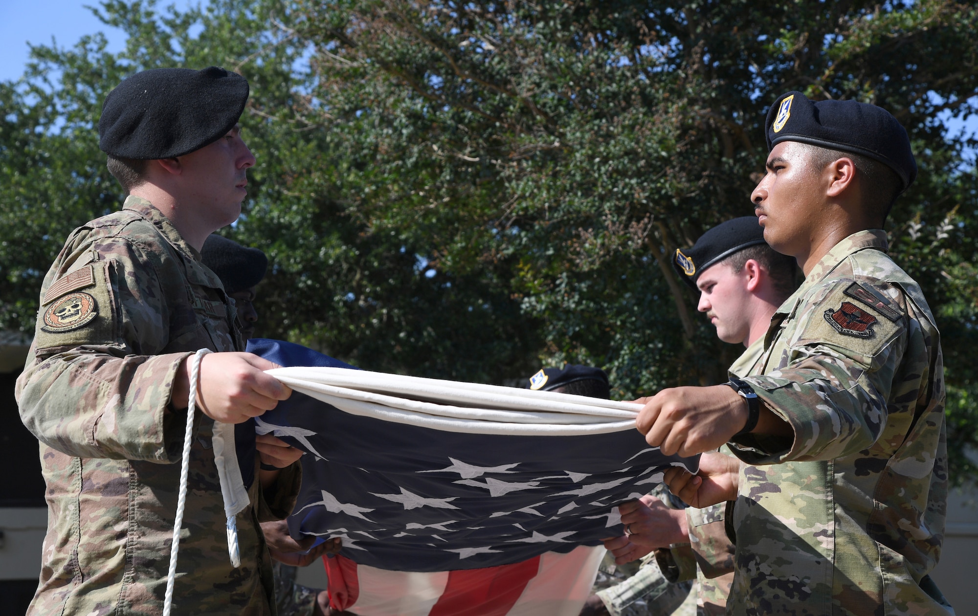 Members of the 81st Security Forces Squadron participate in a retreat ceremony at Keesler Air Force Base, Mississippi, May 20, 2022. The ceremony, hosted by the 81st SFS, was the last of several events held in celebration of this year's Police Week. (U.S. Air Force photo by Kemberly Groue)