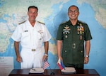 220523-N-XC372-1143 CAMP H M SMITH, Hawaii (May 23, 2022) Adm. John C. Aquilino, Commander of U.S. Indo-Pacific Command, left, and Gen. Andres Centino, Chief of Staff of the Armed Forces of the Philippines, pose for a photo after signing the Maritime Security (Bantay Dagat) Framework at USINDOPACOM headquarters. The framework is designed to enable a holistic, intergovernmental approach to maritime security through the interoperability of U.S. and Philippine maritime forces and option to include interagency organizations, and is a testament to the strength of the U.S. – Philippines alliance. (U.S. Navy photo by Mass Communication Specialist 1st Class Anthony J. Rivera)