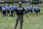 U.S. Air Force Master Sgt. James Robison, 330th Recruiting Squadron recruiter, provides instruction to cadets from Air Force ROTC Detachment 756 in Mayaguez, Puerto Rico.