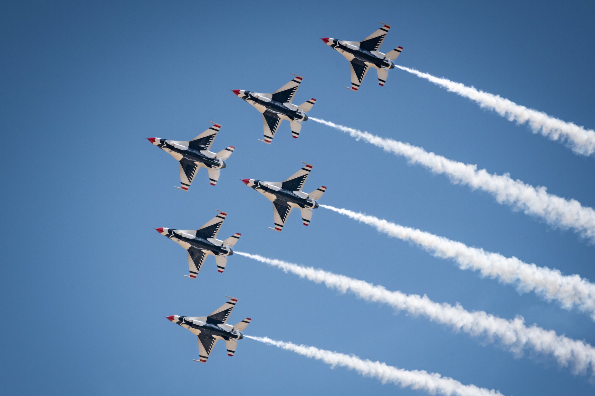 The U.S. Air Force Air Demonstration Squadron “Thunderbirds” perform an air show after the U.S. Air Force Academy Class of 2022 Graduation Ceremony at the Air Force Academy in Colorado Springs, Colo., May 25, 2022. Nine-hundred-seventy cadets crossed the stage to become the Air Force and Space Force’s newest second lieutenants. (U.S. Air Force photo by Joshua Armstrong)