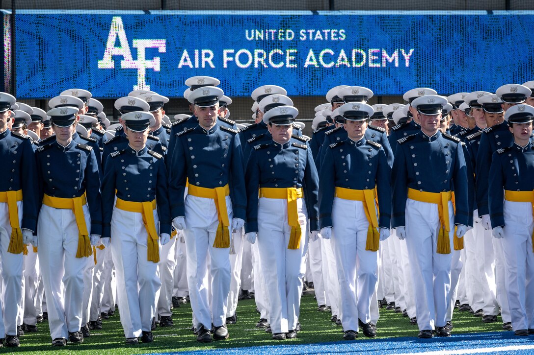Cadets march into Falcon Stadium to start the U.S. Air Force Academy's Class of 2022 Graduation Ceremony at the Air Force Academy in Colorado Springs, Colo., May 25, 2022. Nine-hundred-seventy cadets crossed the stage to become the Air Force and Space Force’s newest second lieutenants. (U.S. Air Force photo by Justin R. Pacheco)