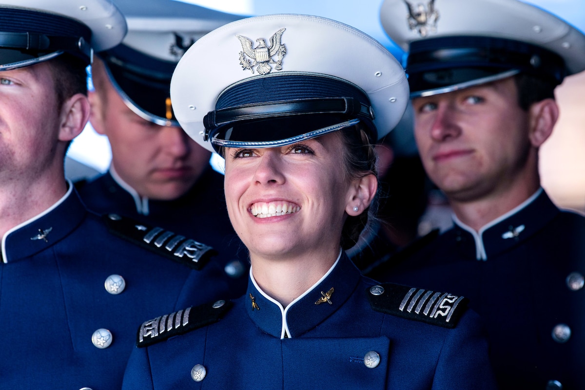 A cadet smiles in excitement before marching into Falcon Stadium during the U.S. Air Force Academy's Class of 2022 Graduation Ceremony at the Air Force Academy in Colorado Springs, Colo., May 25, 2022. Nine-hundred-seventy cadets crossed the stage to become the Air Force and Space Force’s newest second lieutenants. (U.S. Air Force photo by Trevor Cokley)