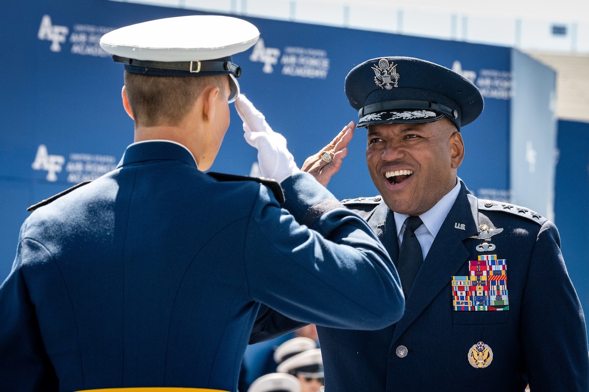 A newly commissioned officer salutes Lt. Gen. Richard M. Clark, U.S. Air Force Academy superintendent, during the Class of 2022 Graduation Ceremony at the Air Force Academy in Colorado Springs, Colo., May 25, 2022. Nine-hundred-seventy cadets crossed the stage to become the Air Force and Space Force’s newest second lieutenants. (U.S. Air Force photo by Justin R. Pacheco)