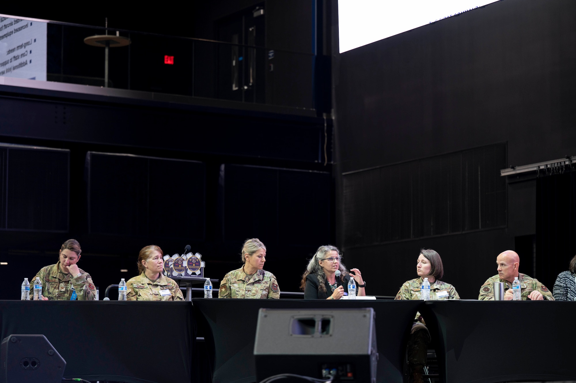 A panel of judges ask questions to submitters as they pitch their innovation ideas live during the iChallenge competition portion of Innovation Day at FORCECON 2022