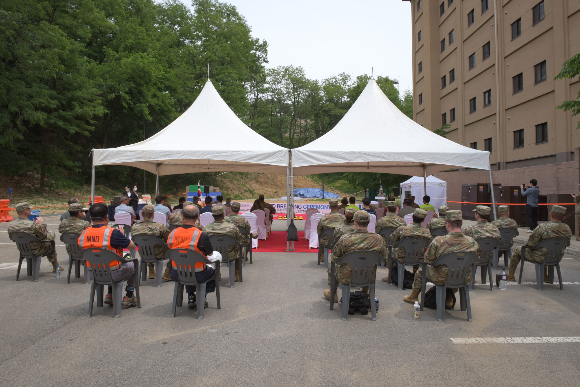 Service members, Korean nationals and special guests gather for the 51st Communications Squadron Headquarters Consolidation Facility Groundbreaking Ceremony at Osan Air Base, 25 May, 2022.