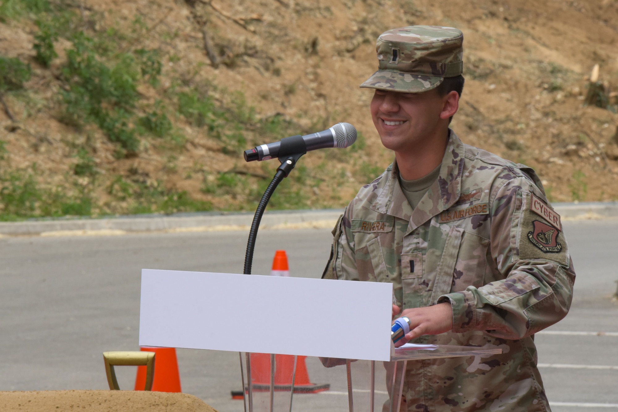 1st Lt. Kevin Rivera, 51st Communications Squadron plans flight commander, provides opening remarks during the 51st Communications Squadron Headquarters Consolidation Facility Groundbreaking Ceremony at Osan Air Base, 25 May, 2022.