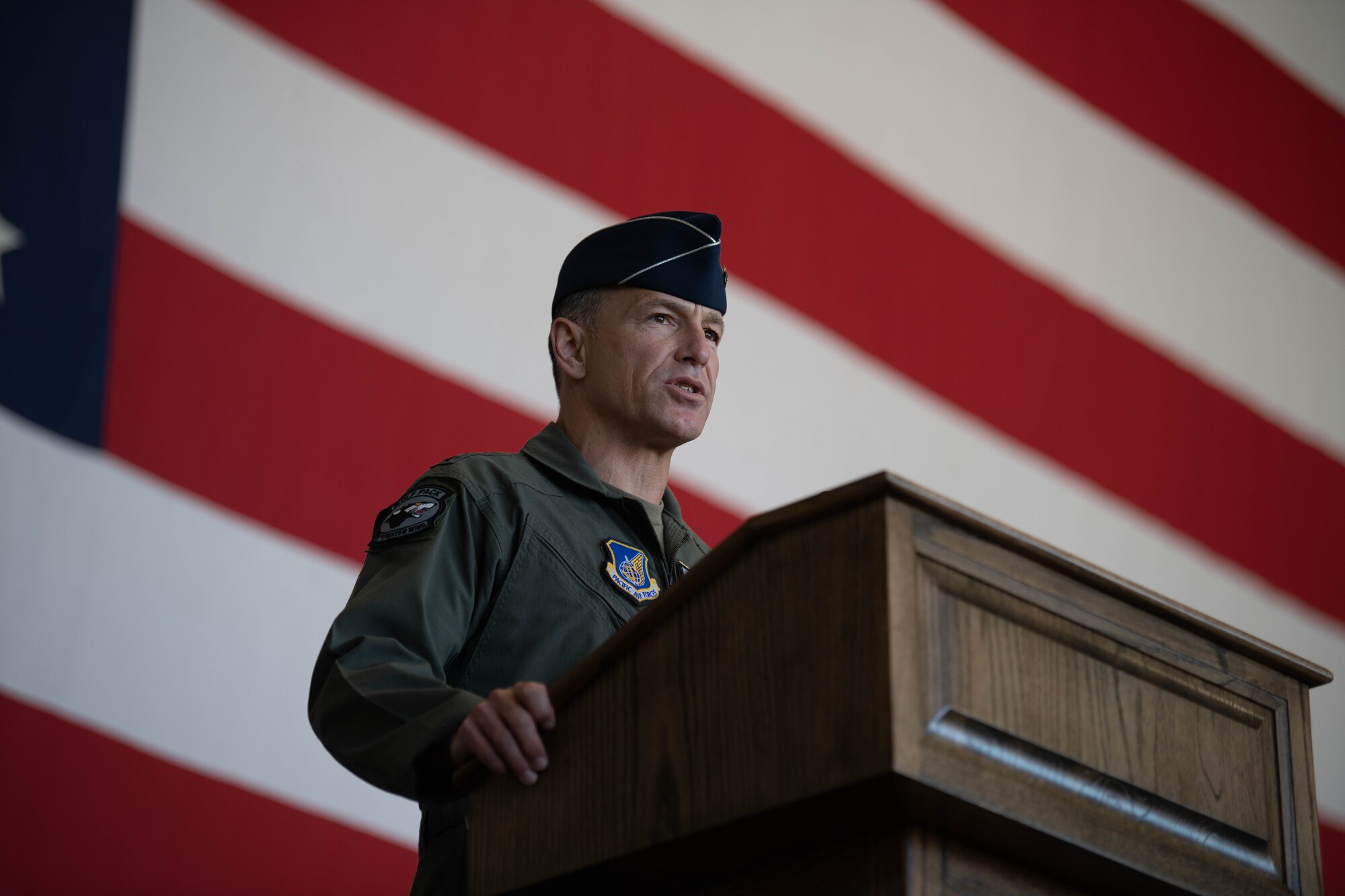Lt. Gen. Scott Pleus, Seventh Air Force commander and presiding officer, speaks during the 8th Fighter Wing change of command ceremony at Kunsan Air Base, Republic of Korea, May 26, 2022. Col. Henry R. Jeffress, III, 8th FW incoming commander, assumed command from outgoing commander, Col. John B. Gallemore. (U.S. Air Force Photo by Senior Airman Shannon Braaten)