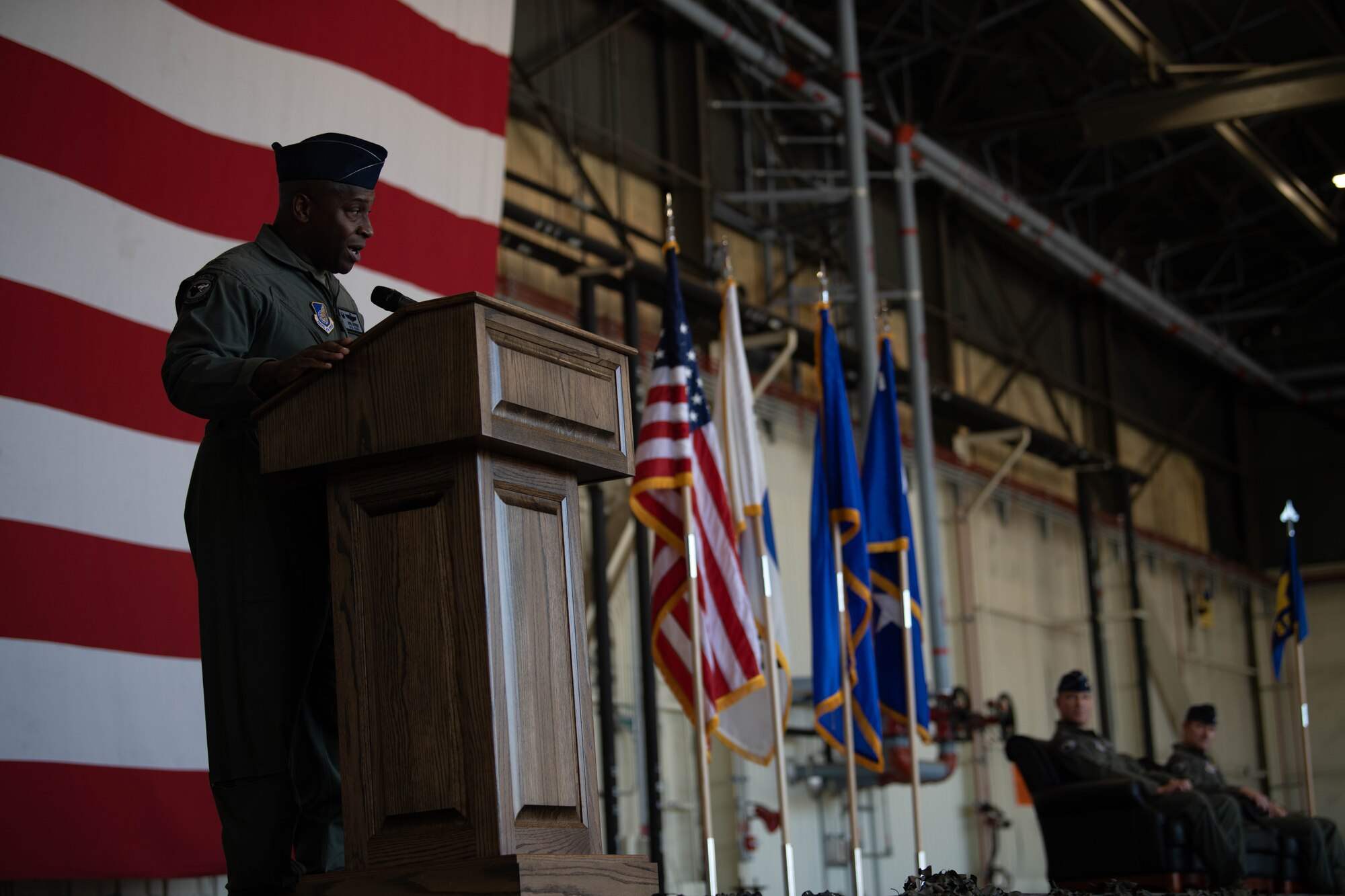 Col. Henry R. Jeffress, III, 8th Fighter Wing incoming commander, speaks during the wing change of command ceremony at Kunsan Air Base, Republic of Korea, May 26, 2022. Jeffress, or Wolf 62, assumed command of the 8th FW from the outgoing commander, Col. John B. Gallemore.  (U.S. Air Force Photo by Senior Airman Shannon Braaten)