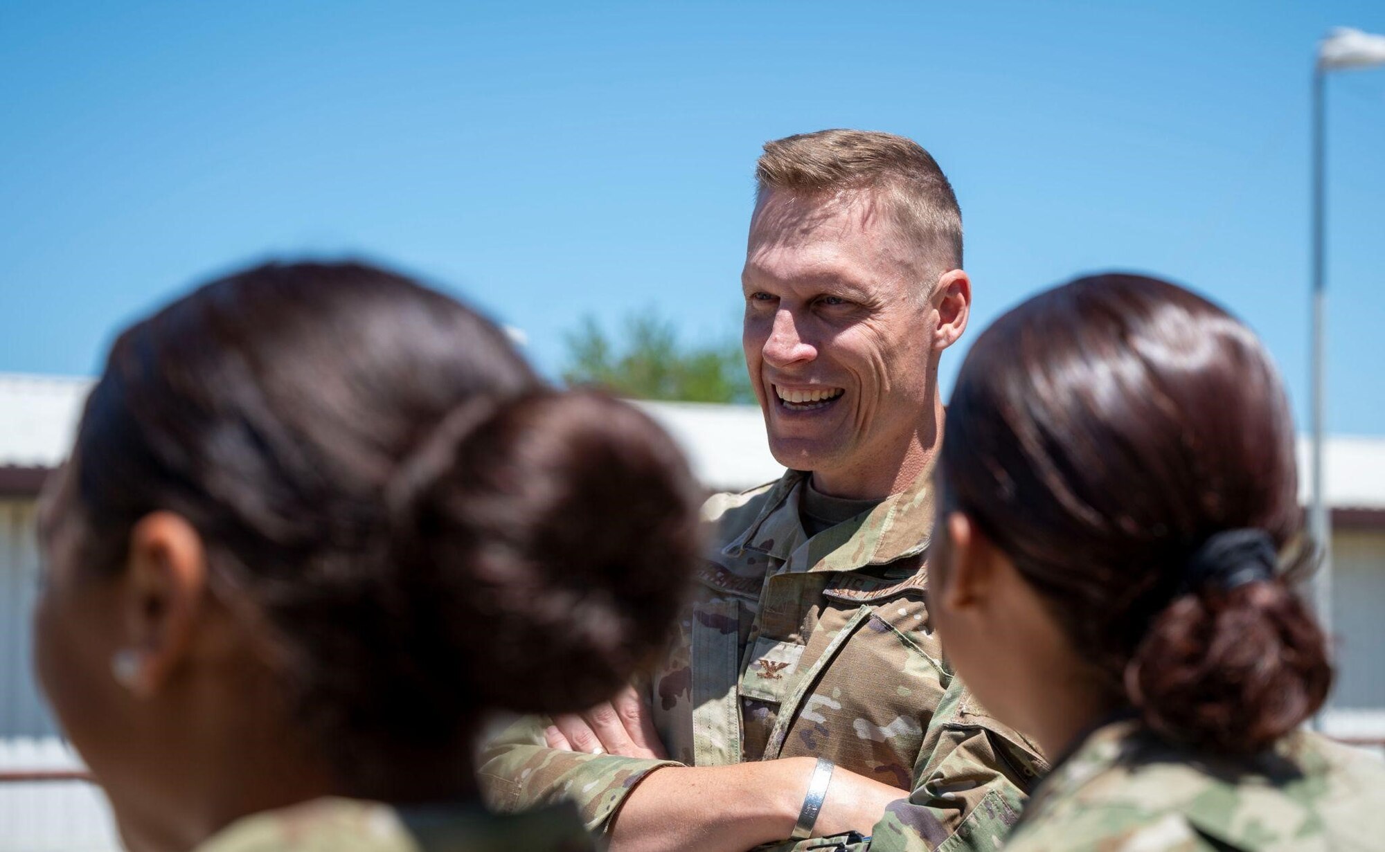 Col. Ryan Richardson, United States Air Forces in Europe - Air Forces Africa Director of Manpower, Personnel, and Services, speaks with 39th Force Support Squadron readiness in base services Airmen at Incirlik Air Base, Turkey, May 20, 2022. During his visit, Richardson engaged with Airmen recognizing them for their accomplishments, and toured various FSS facilities gaining insight from FSS Airmen on how their facilities can improve. (U.S. Air Force photo by Staff Sgt. Gabrielle Winn)