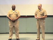 IMAGE: Naval Surface Warfare Center Dahlgren Division Commanding Officer Capt. Philip Mlynarski swears-in newly promoted Master Chief Petty Officer Justin Preyer during a Naval frocking ceremony on May 25 at Mayport Navy Base in Jacksonville, Florida.