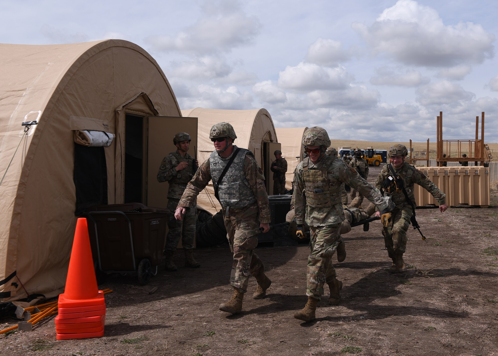troops marching with a litter