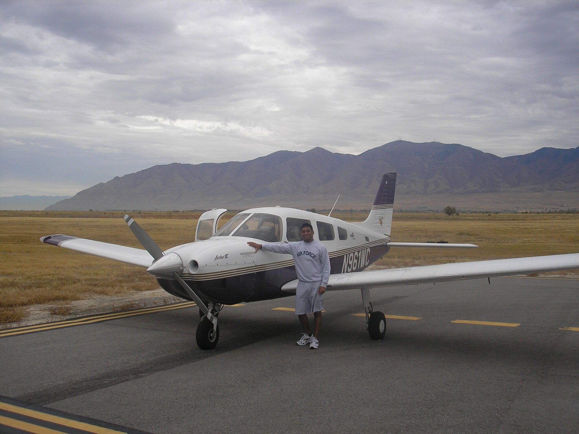 Airman in front of aircraft