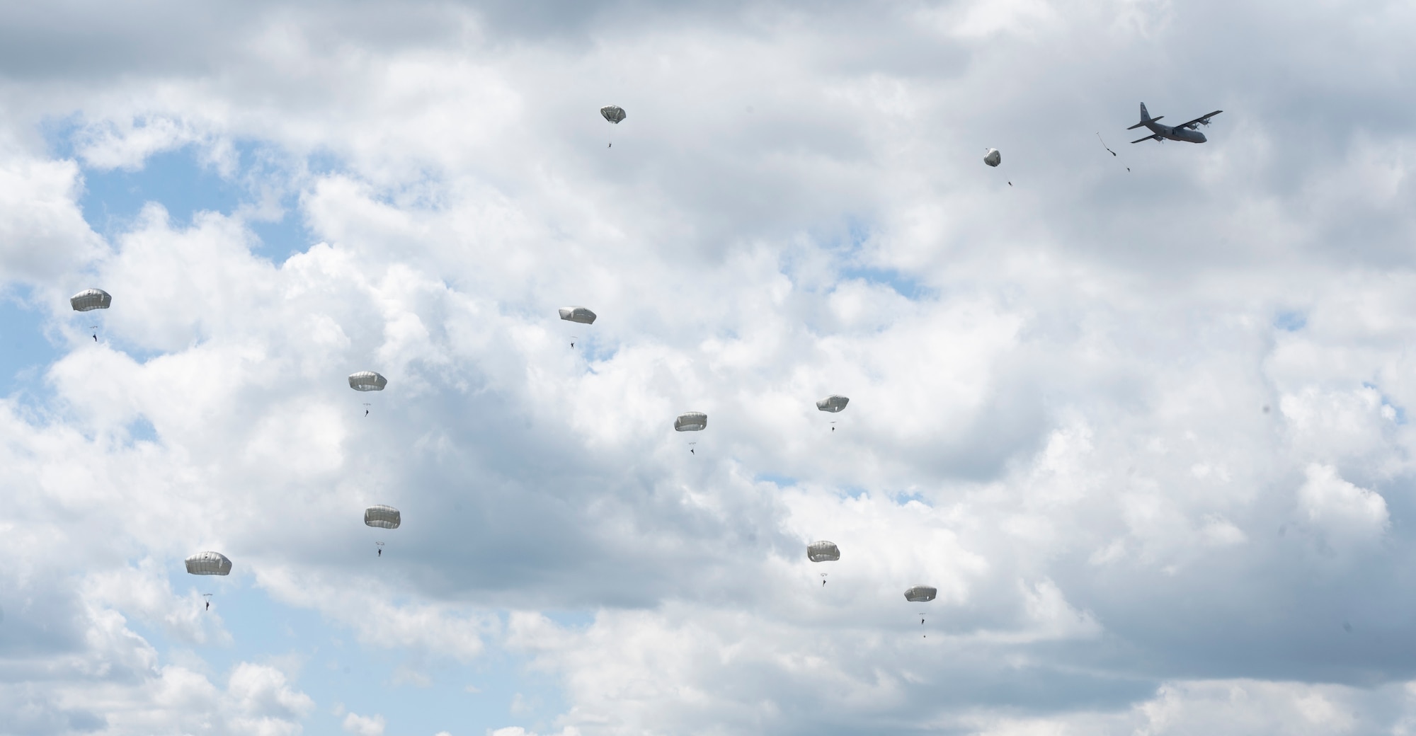 Eighty U.S. Army paratroopers jump from nine C-130J Super Hercules aircraft