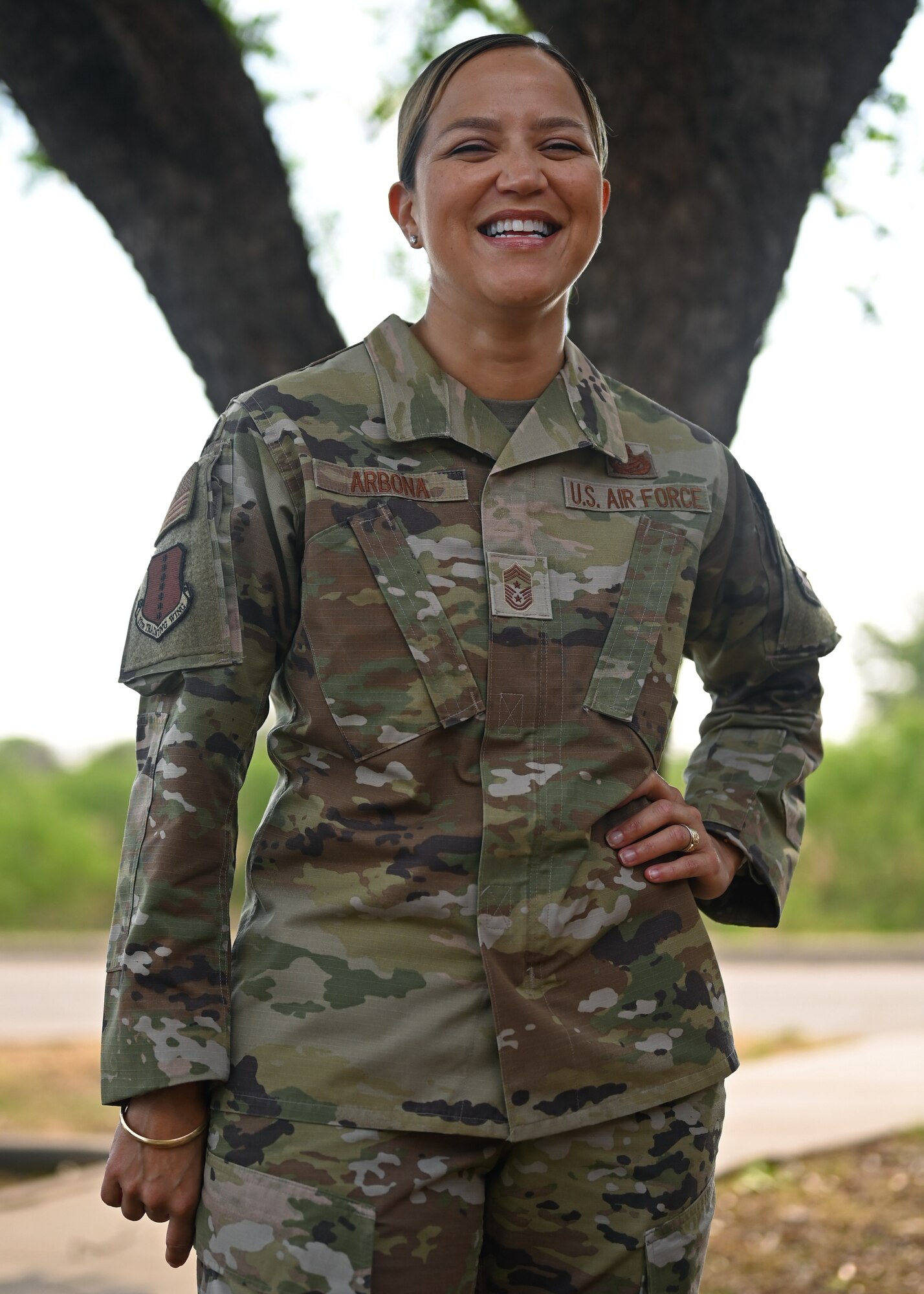 U.S. Air Force Chief Master Sgt. Rebecca Arbona, 17th Training Wing command chief, poses for a photo for Asian American and Pacific Islander Heritage Month at Goodfellow Air Force Base, Texas, May 13, 2022. Arbona was proud to represent her Filipino heritage during AAPI Heritage Month. (U.S. Air Force photo by Senior Airman Ethan Sherwood)