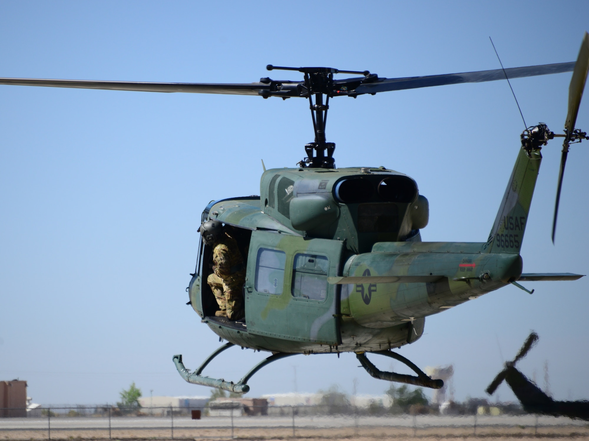 Spouses were given orientation flights on the UH-1N Huey as part of the 150th and 58th Special Operations Wing’s annual Spouses Day event at Kirtland Air Force Base, New Mexico. May 14, 2022. (U.S. Air Force photo by Jeremy T. Dyer.)