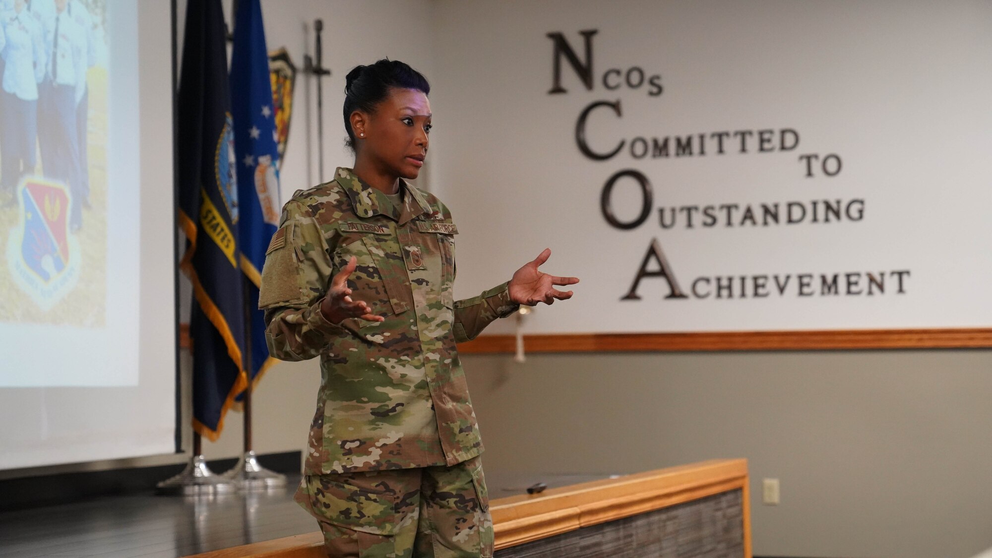 U.S. Air Force Chief Master Sgt. Stephanie Patterson, Mathies NCO Academy commandant, addresses senior leadership at the MNCOA on Keesler Air Force Base, Mississippi, May 19, 2022. MNCOA staff held the open house to inform base leadership on the NCOA leadership courses taught to technical sergeants.