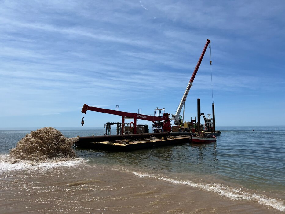 U.S. Army Corps of Engineers contractor, The King Co., Inc. conducts maintenance dredging at Holland Harbor in Michigan May 2022.