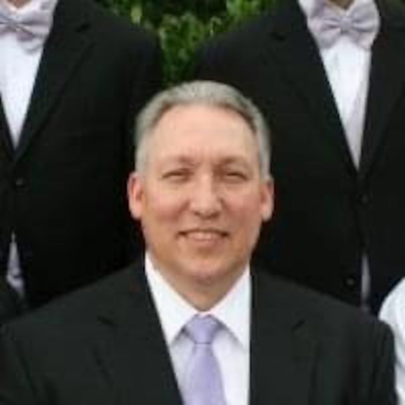 Head shot of a man in a tux.